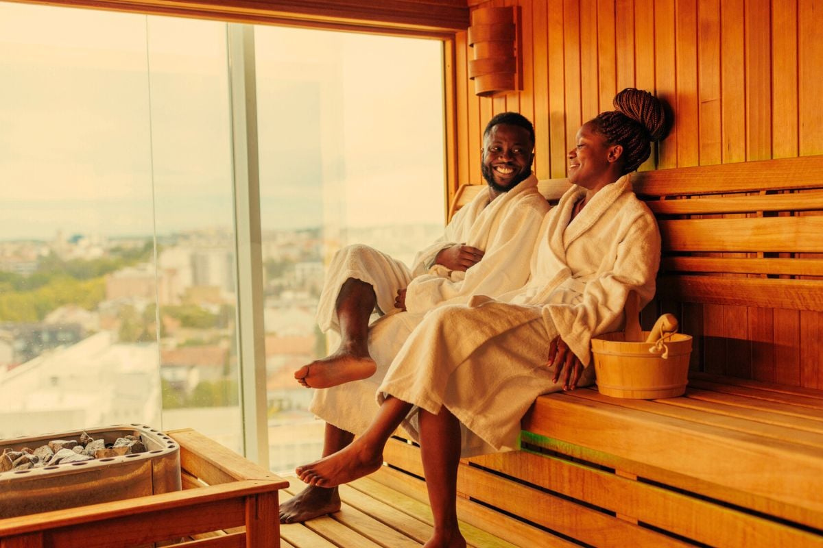 couple enjoying luxury sauna at hotel spa