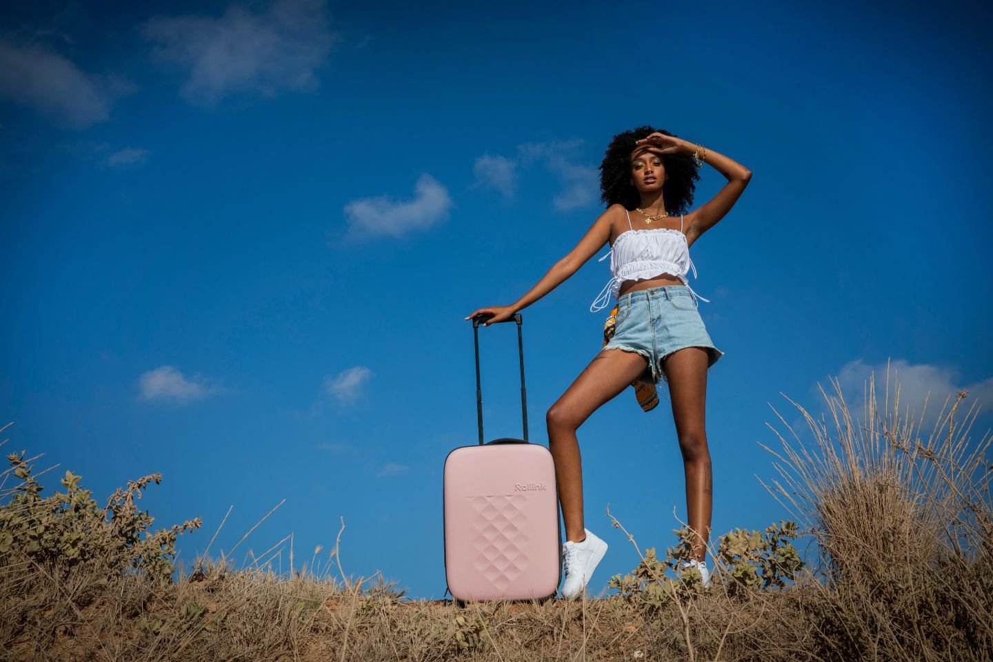 woman with Rollink suitcase