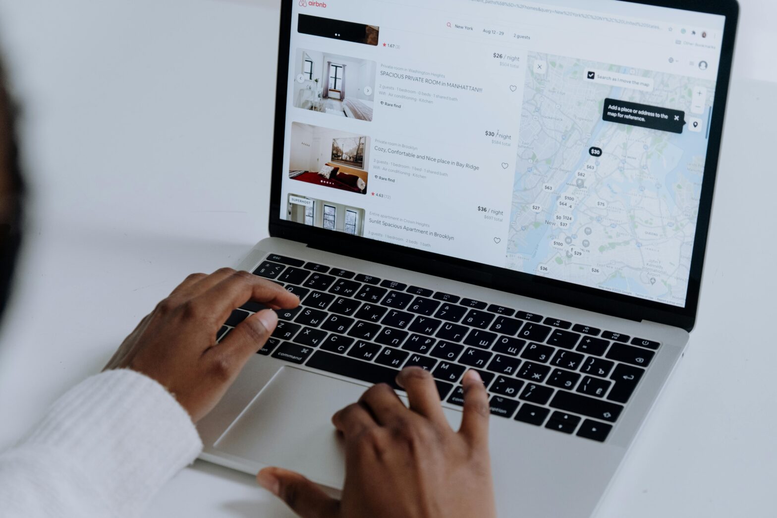 woman scrolling on Airbnb