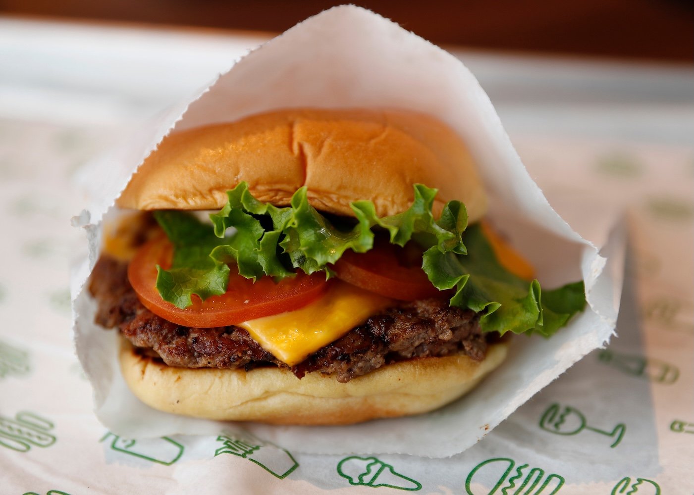 Shack Burger; Cheeseburger with lettuce, tomato, ShackSauce," single.