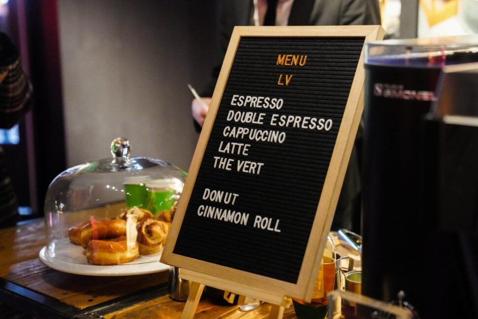 coffee shop signage on counter at Ephemeral Pop Up Store Louis Vuitton X Virgil Abloh