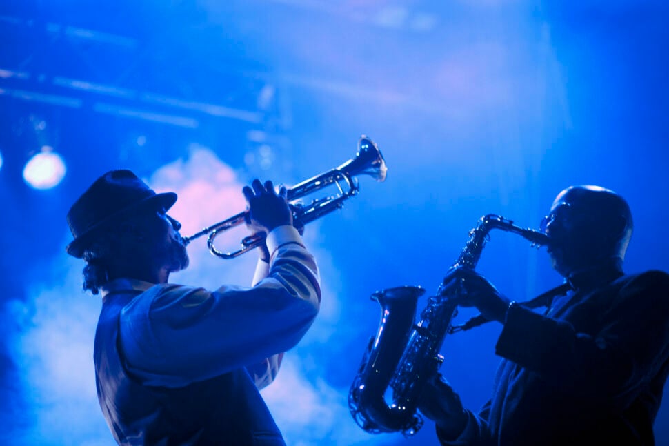 Musicians playing in jazz band on stage