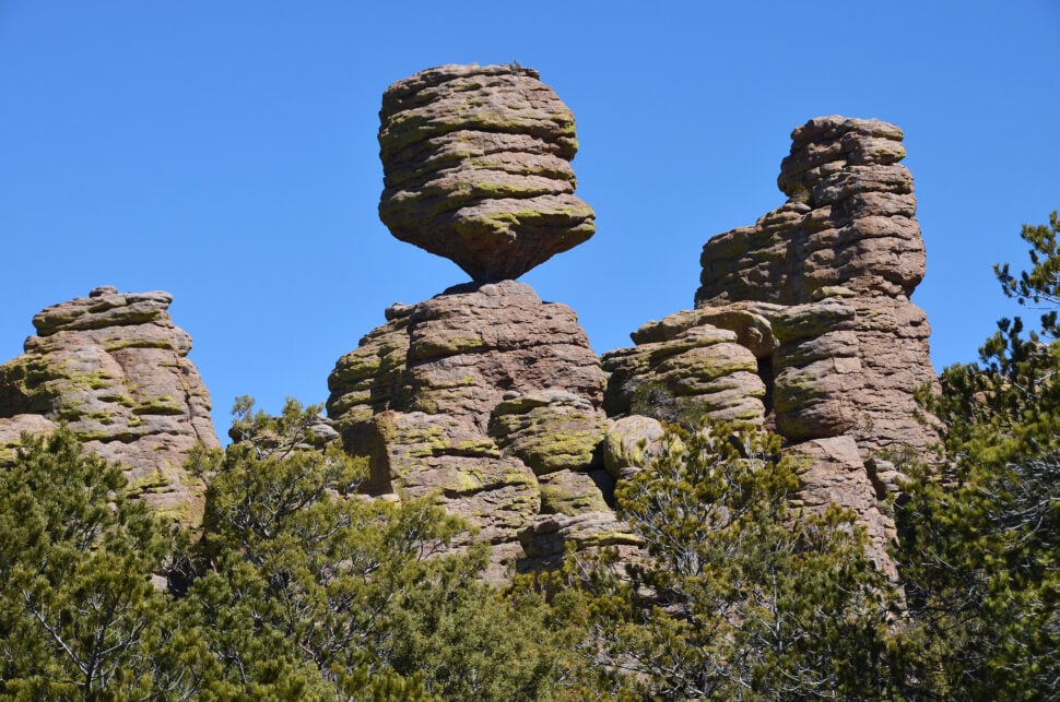 Balanced Rocks at Chiricahua National Monument in southern Arizona, near the border with New Mexico.The park is a wonderland of rocks where erosion has carved the volcanic rock into weirdly shaped pinnacles, hoodoos, balanced rocks and chimneys. The 8 mile paved scenic drive and lots of hiking trails make Chiricahua a wonderful destination for nature lovers.