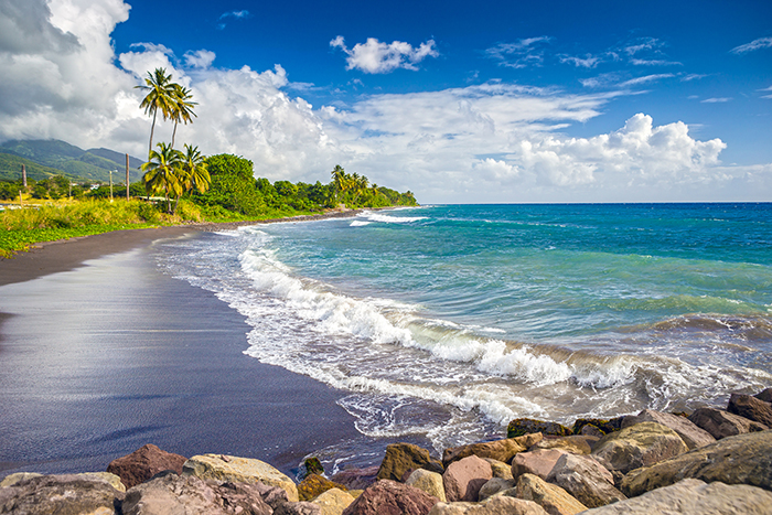 Beach on a St. Kitts island with black sand