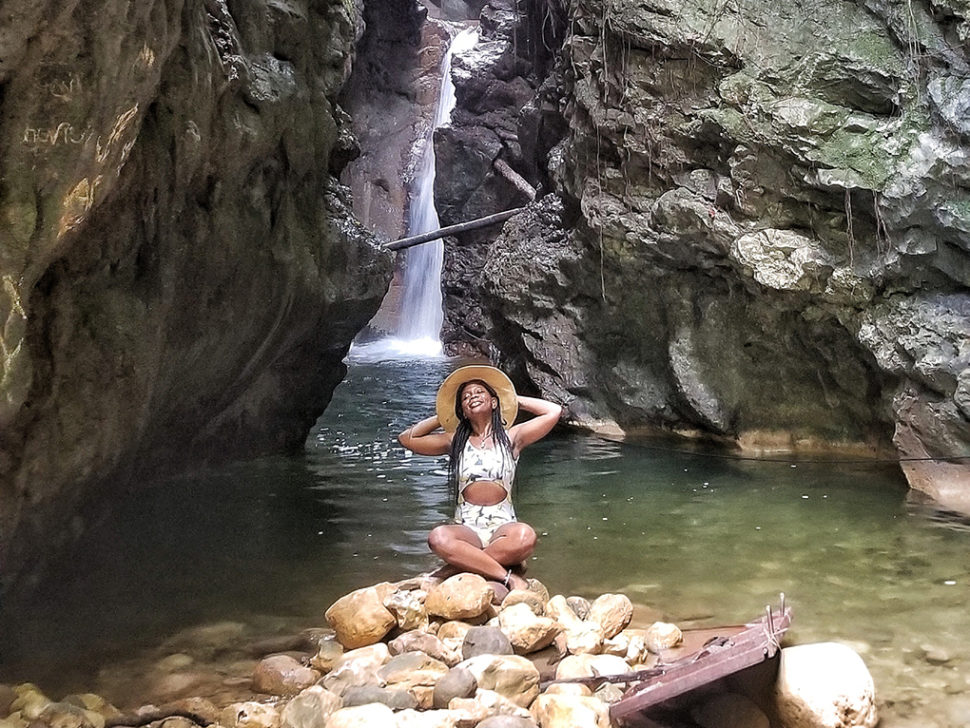 Doreen at waterfall in Jamaica.