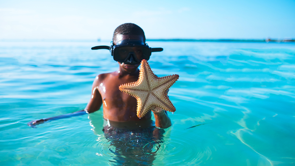 Boy snorkeling on the island.