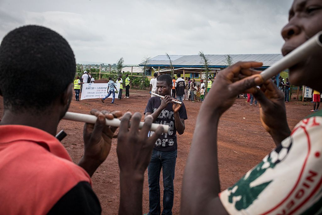 Why Congo's Fulu Miziki Band Uses Recycled Trash To Create Instruments And Costumes