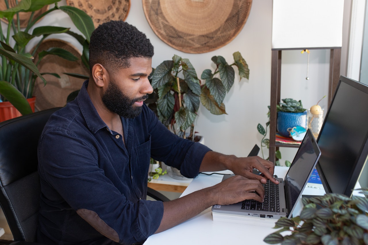 Man at desk on laptop working