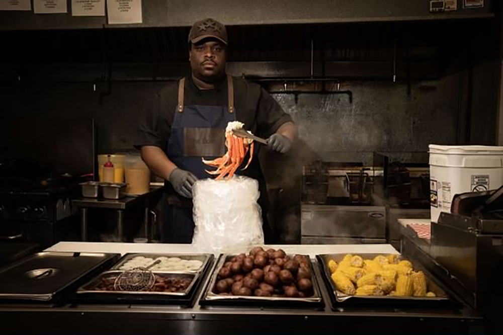 Meet The 31-Year-Old Behind Buckhead's 1st Black-Owned Seafood Boil Restaurant