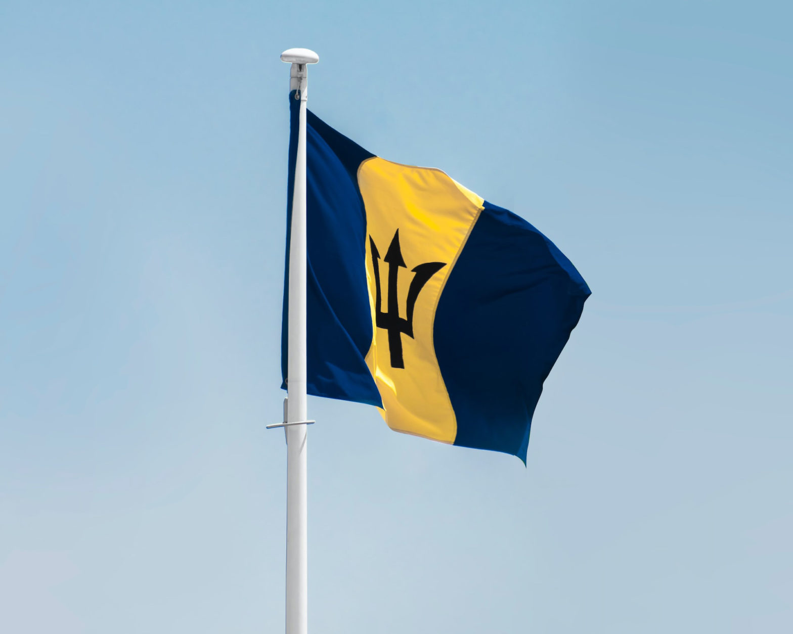 Barbados country flag waiving in the air