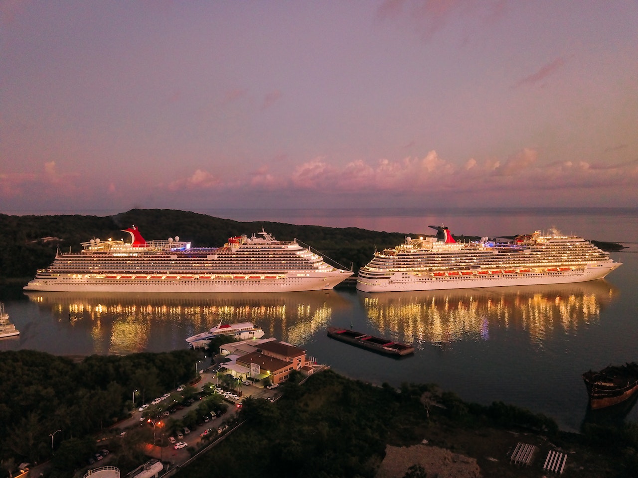 two carnival cruise ships at sea