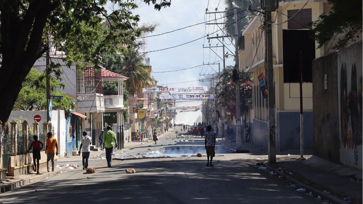 People walking the streets of Haiti in the midst of Crisis