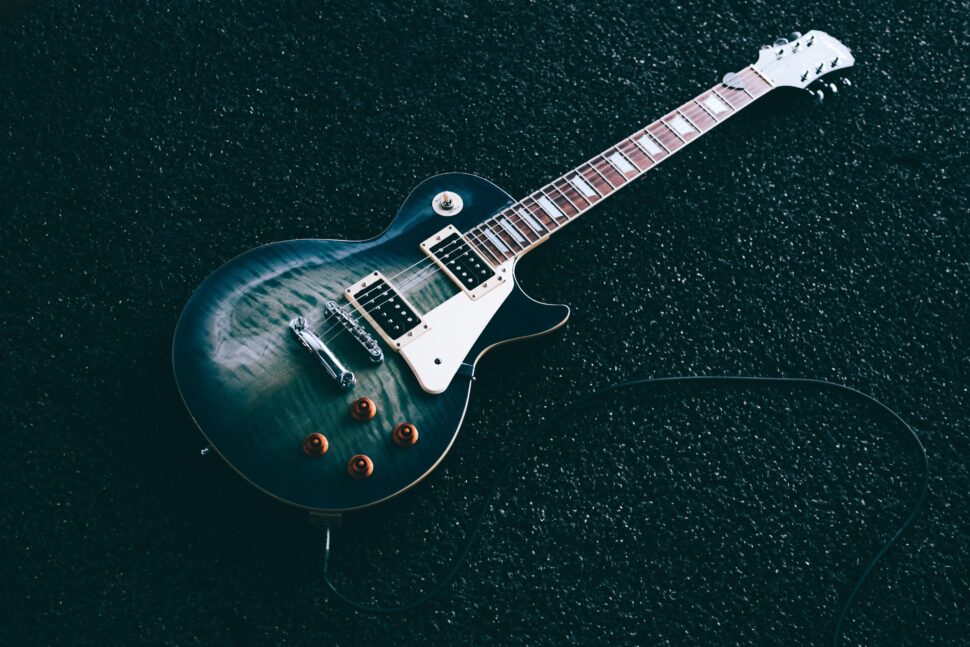 image of guitar on black background black restaurant week