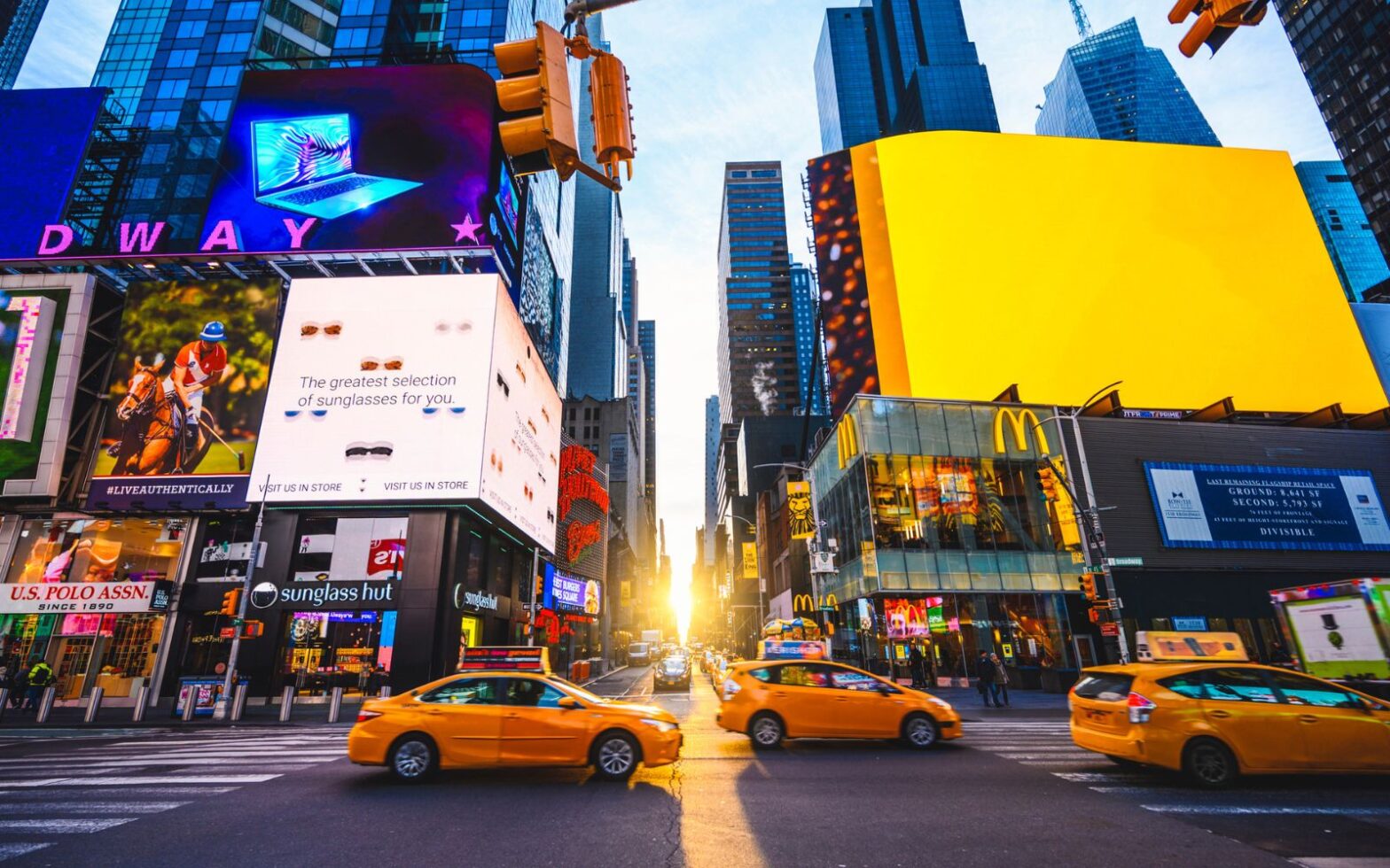 afternoon view of buildings in Time Square - fastest way to get to JFK Airport from Times Square