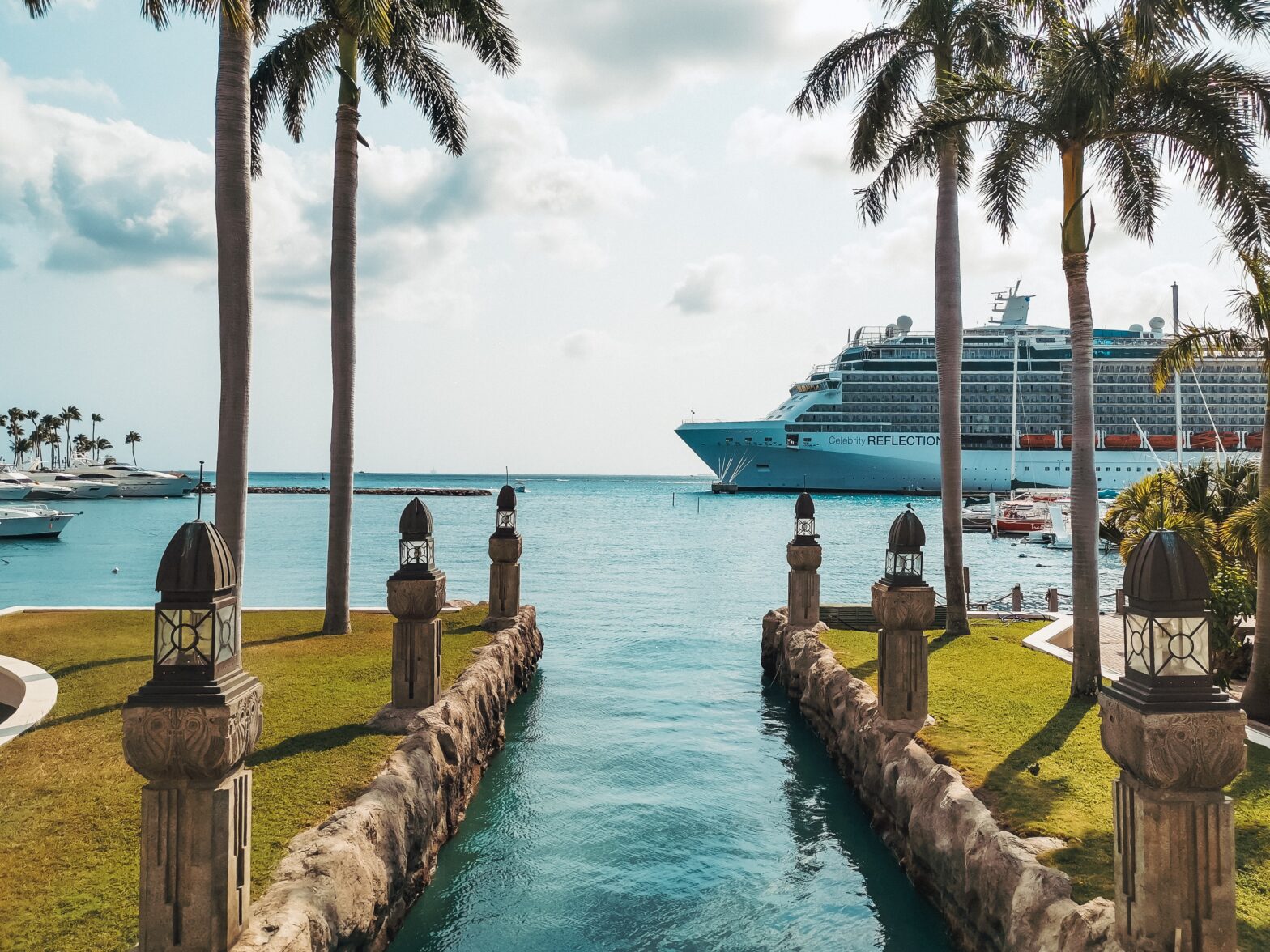 water view of Aruba with cruise ship in the distance