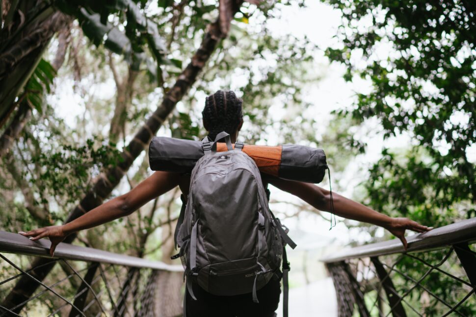 Black woman in hiking community in the woods