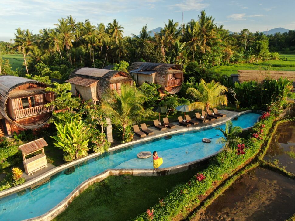 is bali safe? Pictured: The outside exterior of the Beehouse Dijiwa in Ubud, Bali with the lagoon pool.