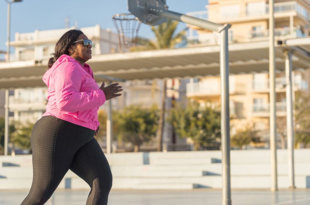 Black woman walking outside