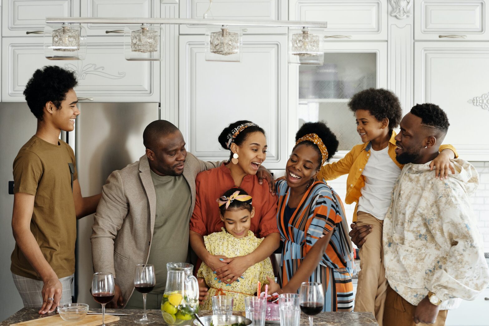 family together in a kitchen