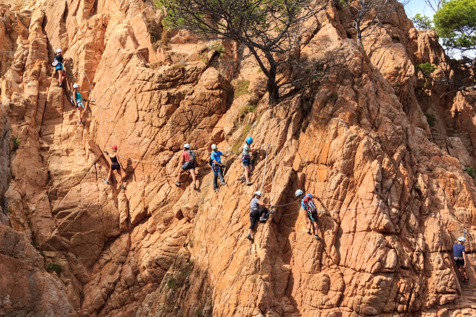 Hiking via ferrata trails in Dolomite Mountains