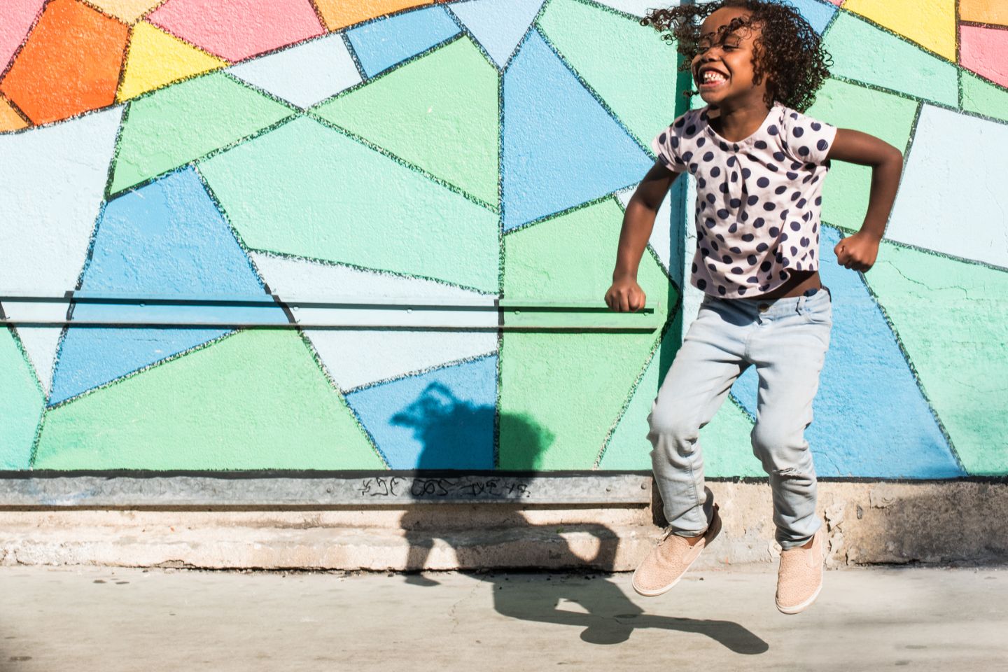 girl jumping outside