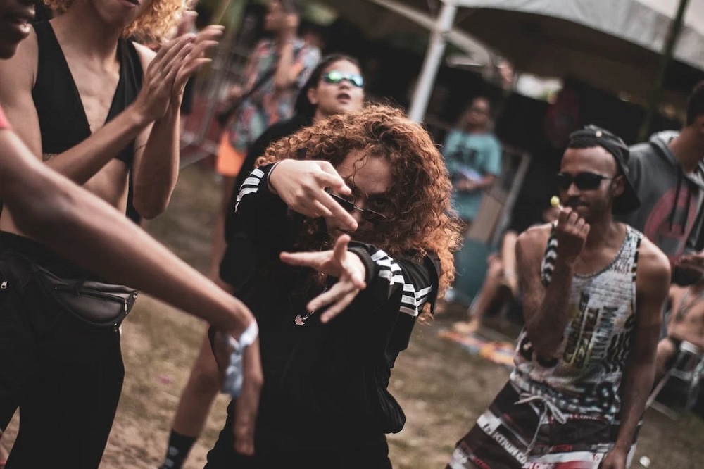 Woman dancing in crowd