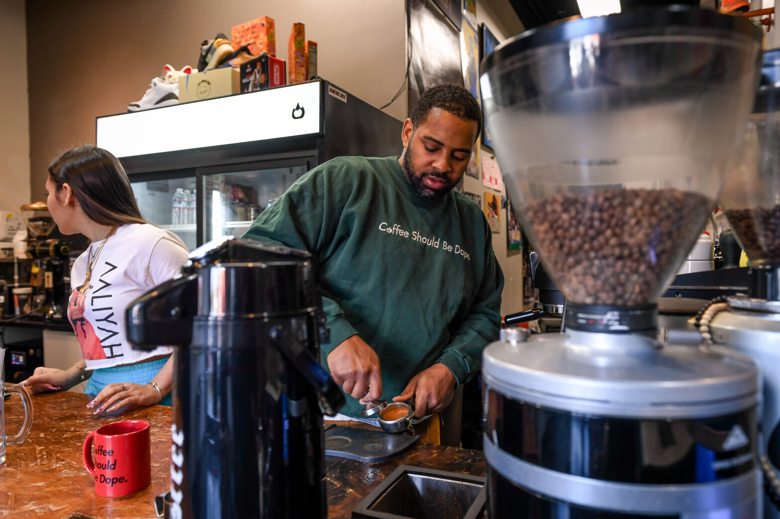 man working at coffee shop