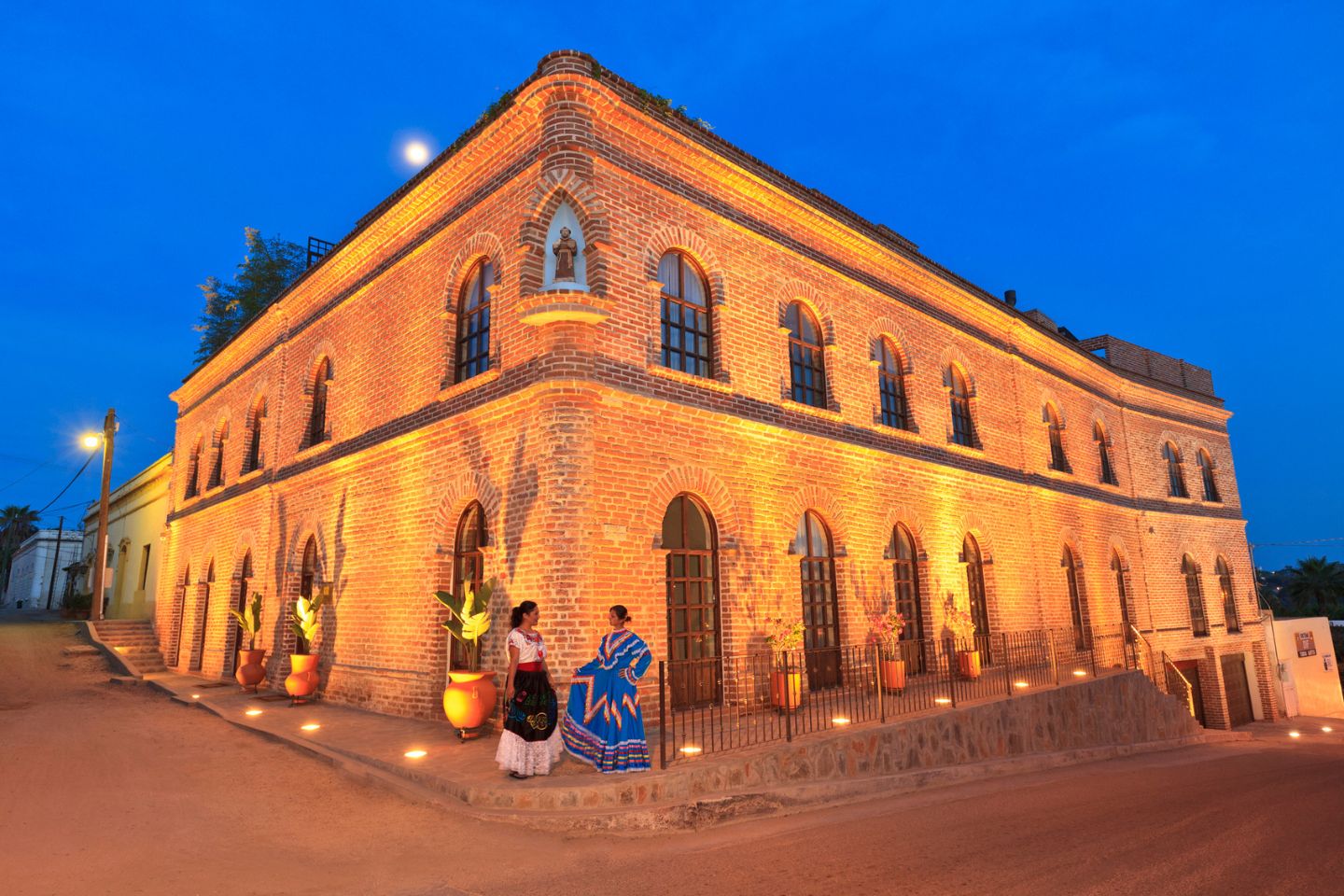 women in Todos Santos Mexico at dusk