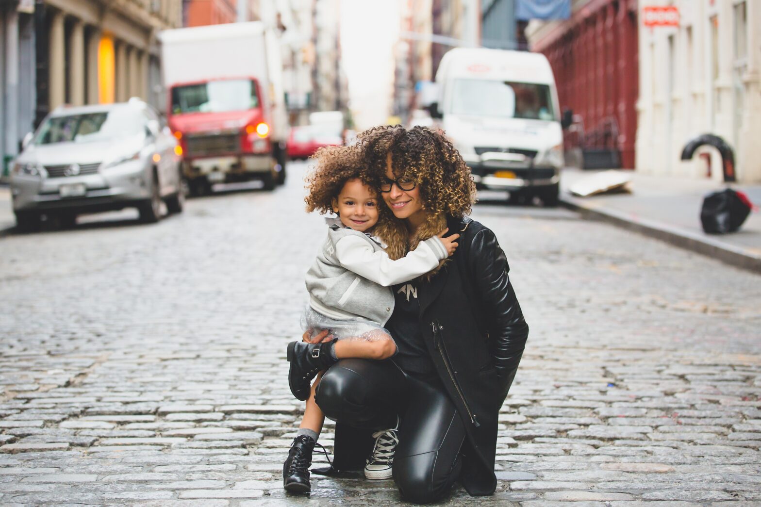 mother with child on street