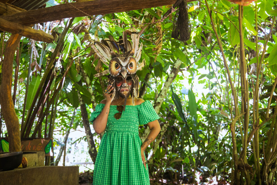 Kelsey Marie (@kelseydashmarie) holding wooden mask