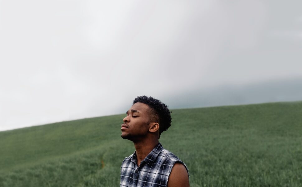 man looking up at sky