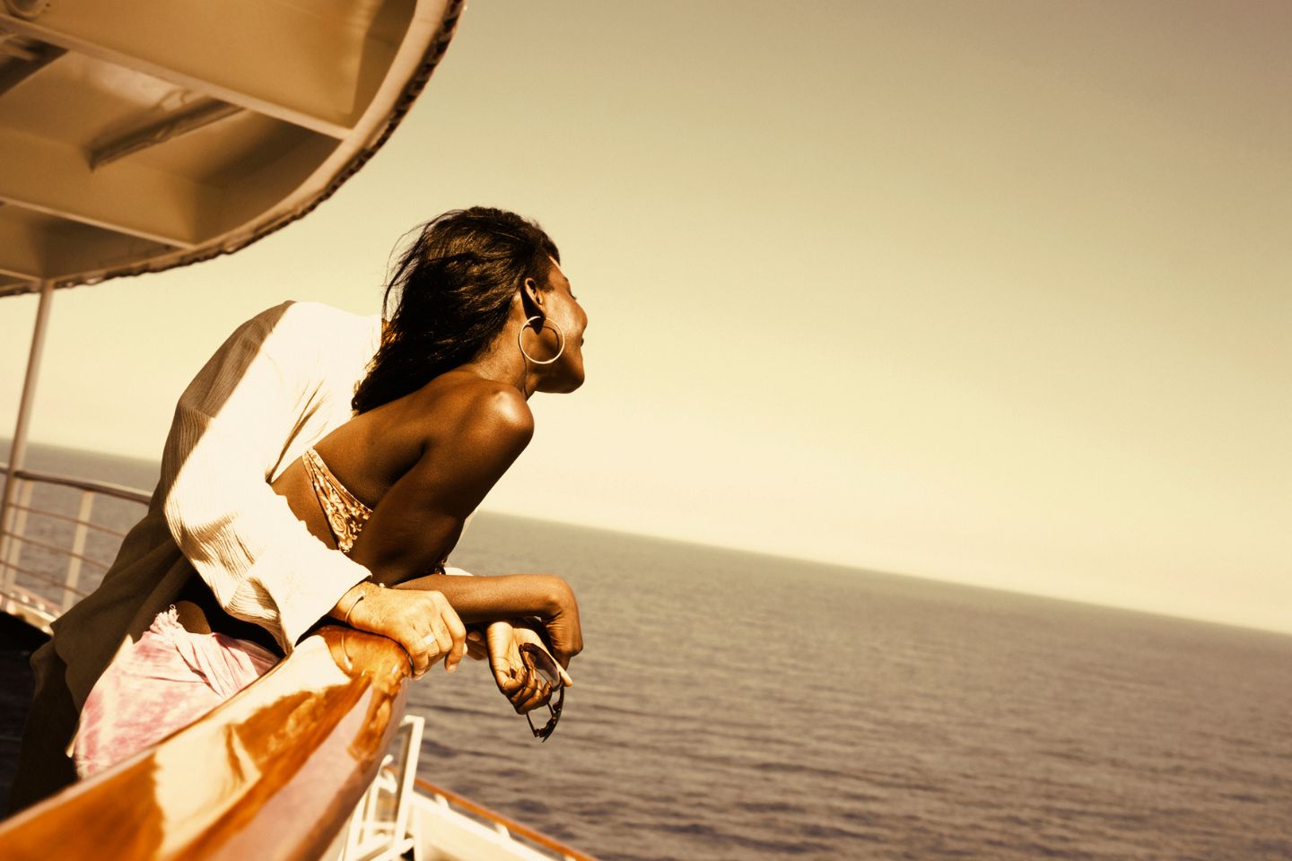 woman standing near balcony on a cruise