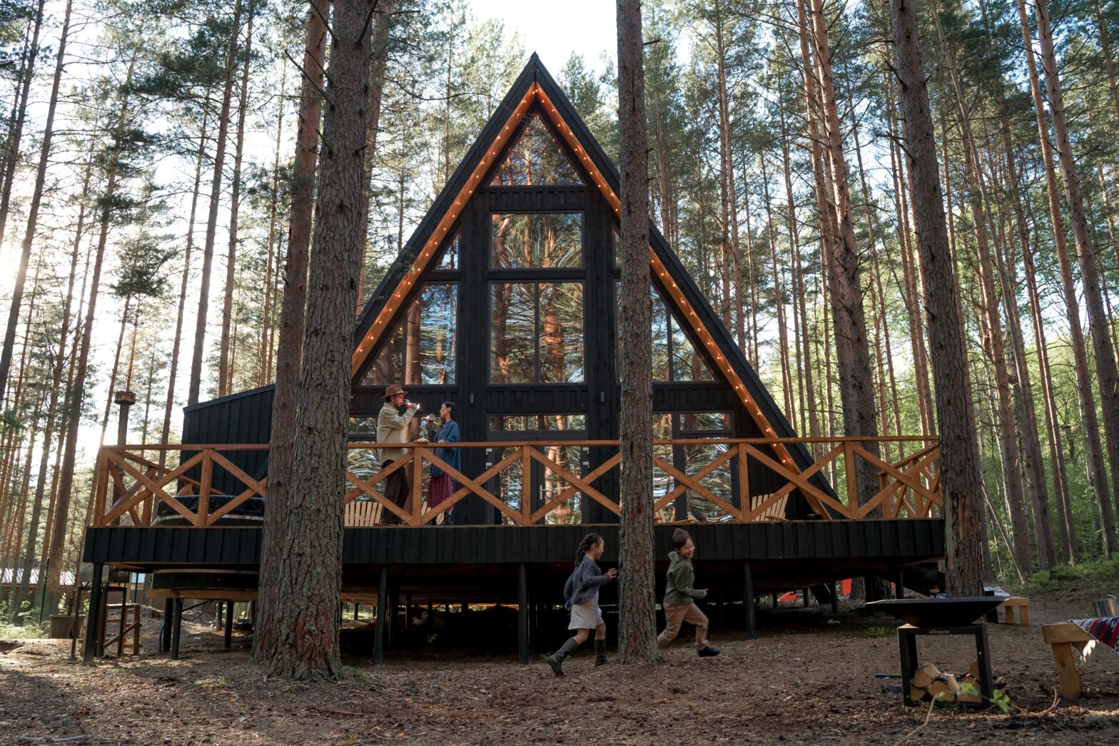 A luxury rustic cabin with a triangle shape.