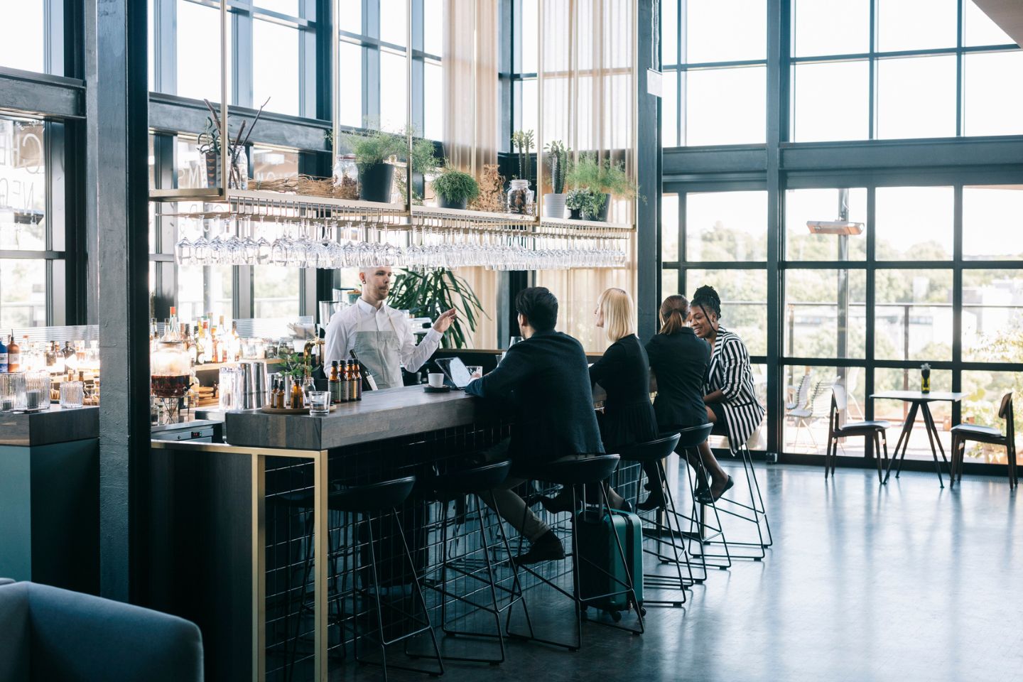 people sitting at airport bar