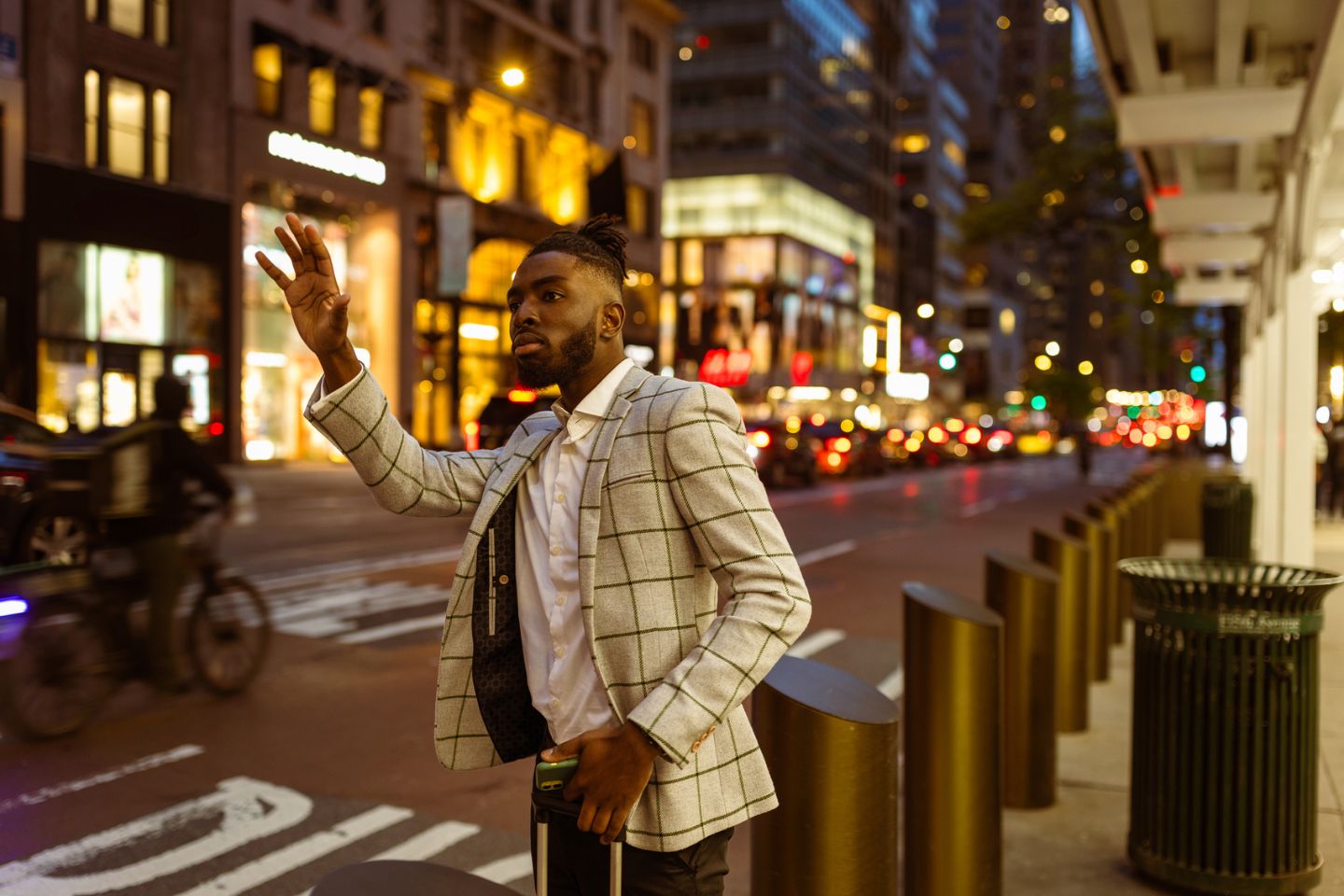 man hailing a taxi