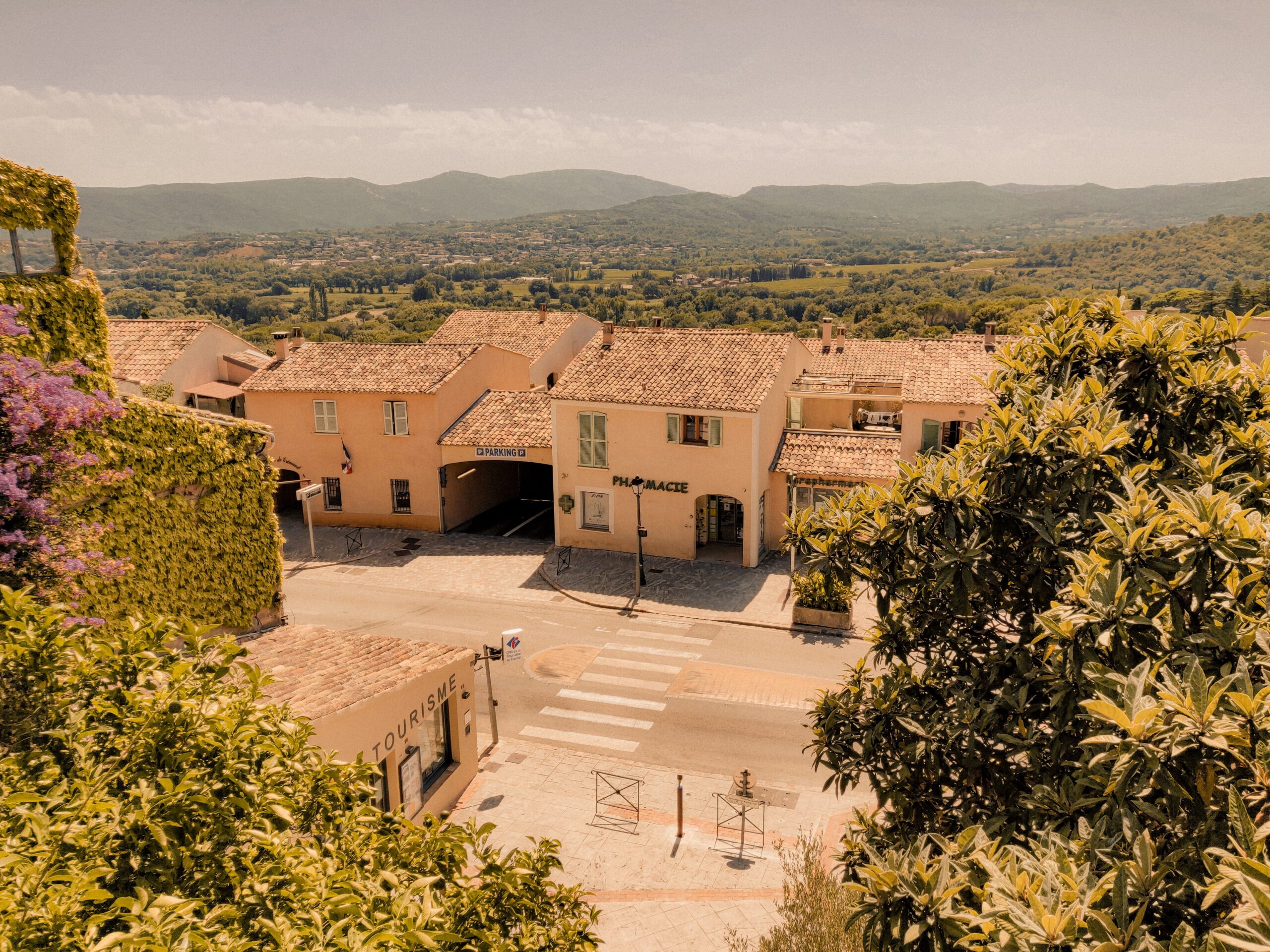 Grasse is an iconic fragrance destination in the south of France. 
Pictured: The small Mediterranean town of Grasse and the green valleys of the French countryside 