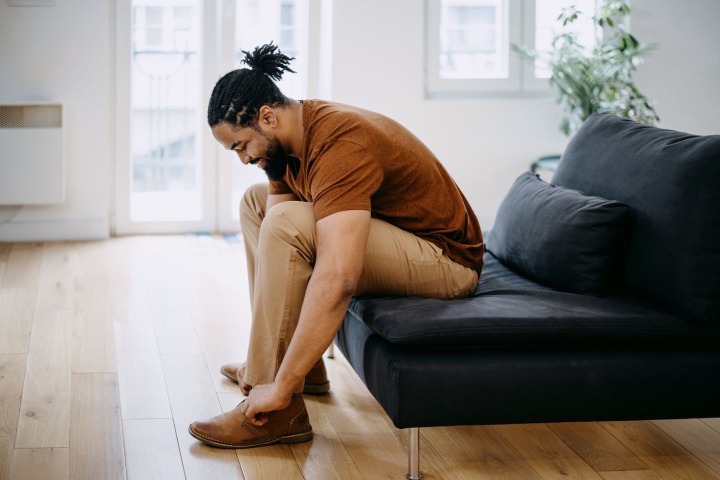 man getting dressed