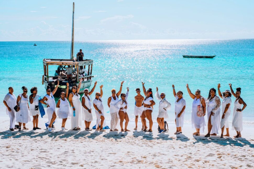 group of shot women on beach on vacation