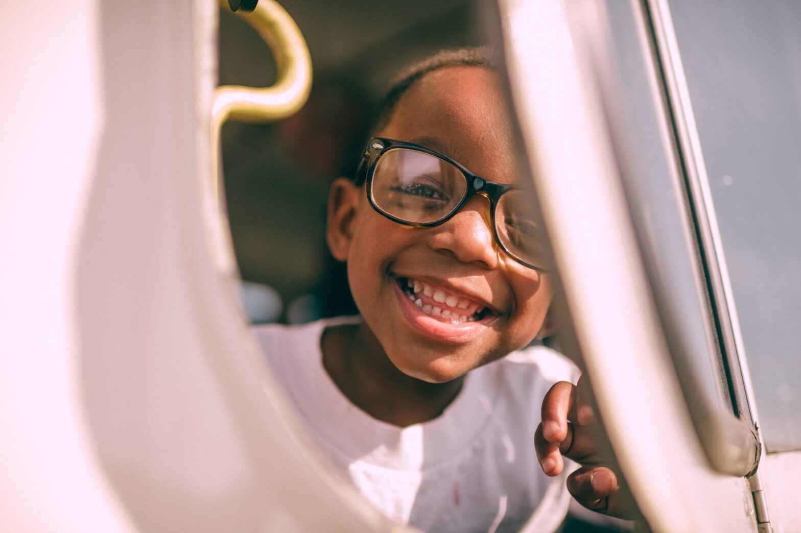 child looking out a window