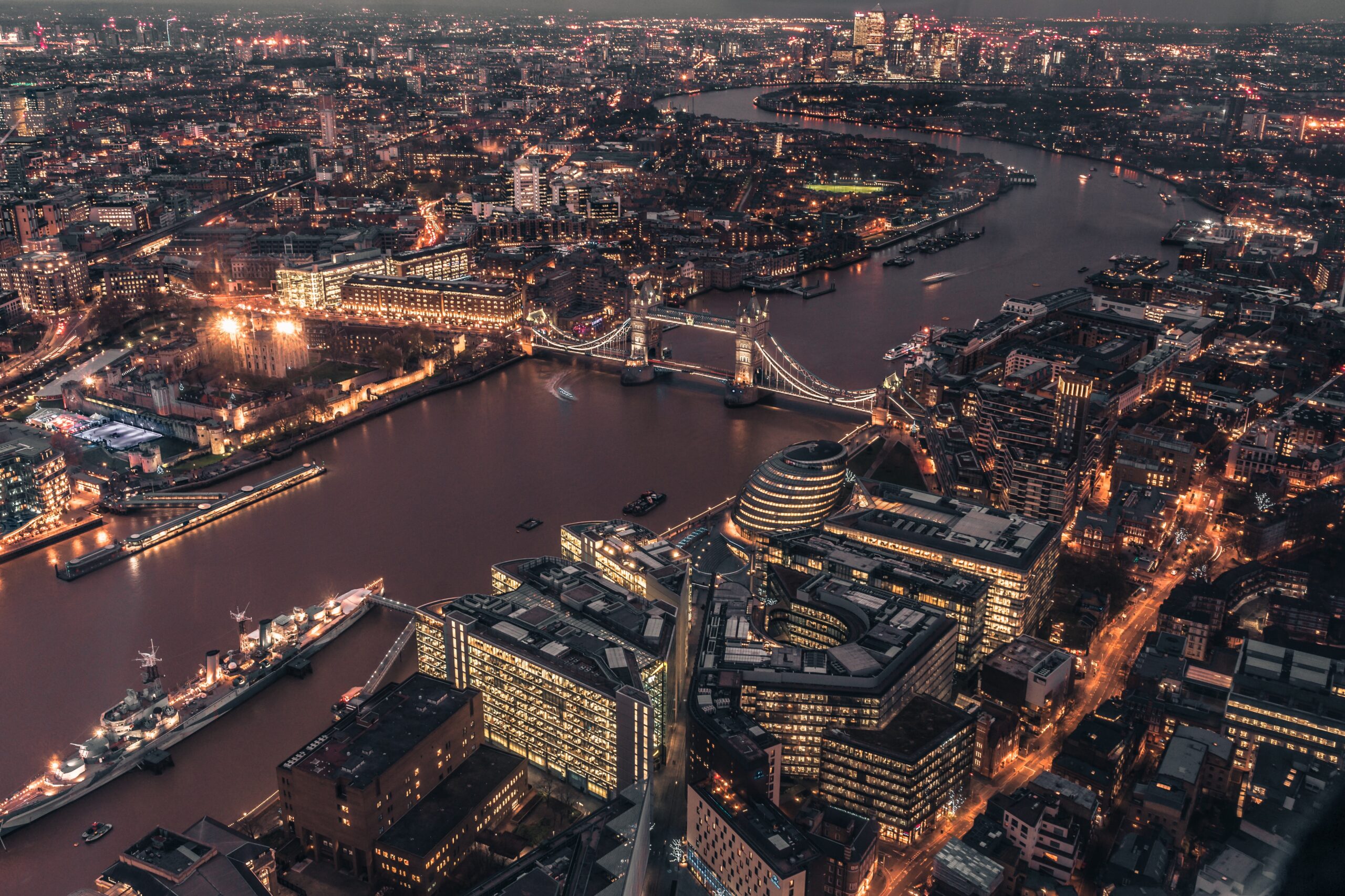 Experience three thrilling days in London with a line up of exciting excursions. 
pictured: An overhead view of London's inner city at night, with twinkling lights aglow 