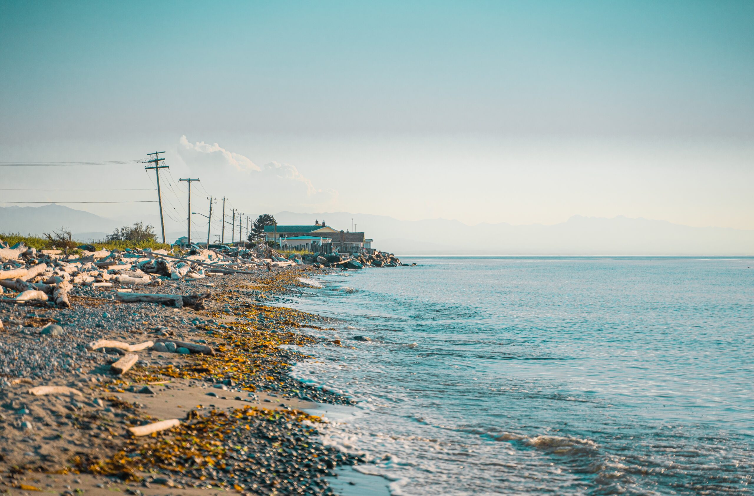 NAS Whidbey Island in Washington is a location that helped bring the film "Top Gun: Maverick" onto the big screen.
pictured: Whidbey Island Beach with secluded shores and clear skies