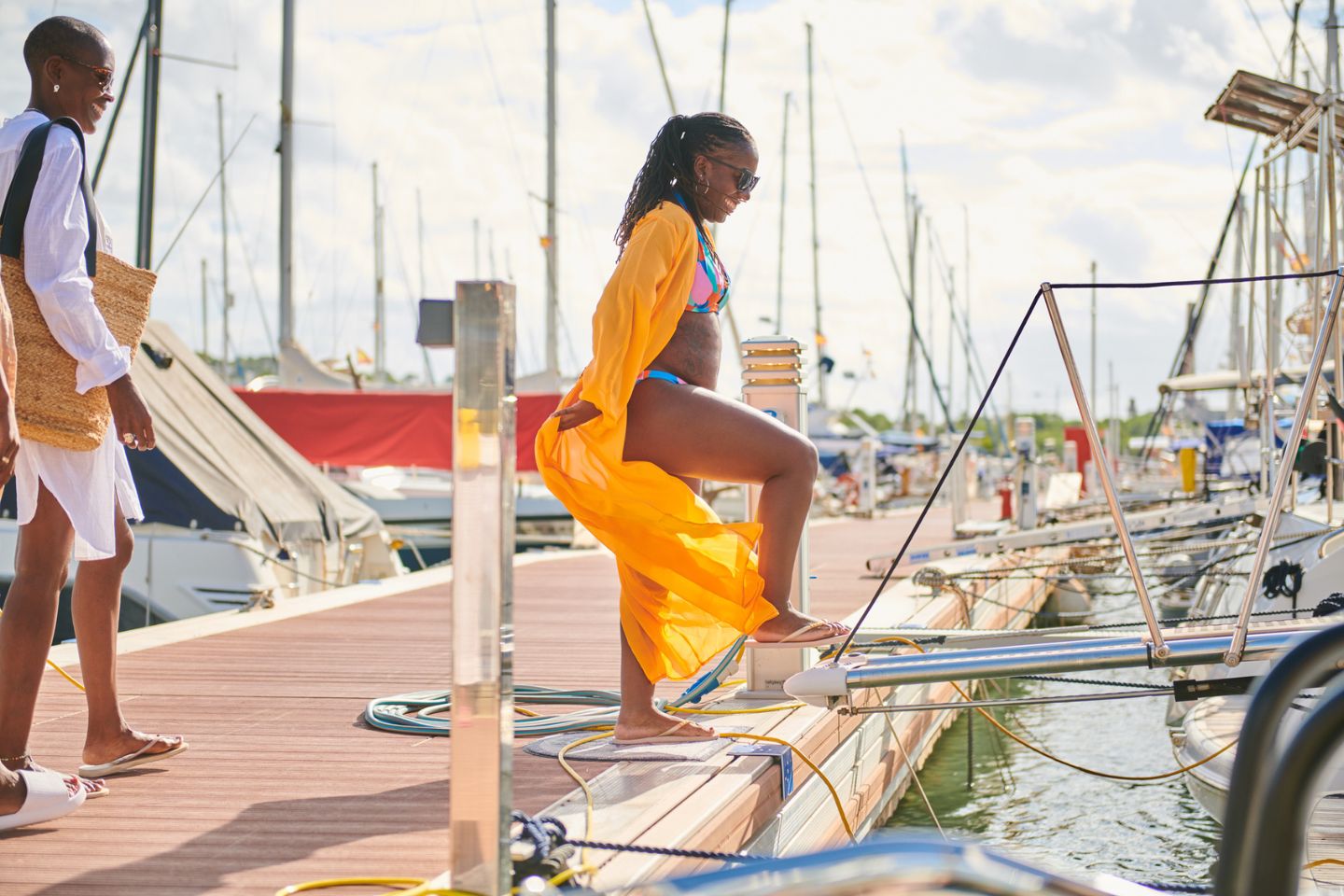 woman getting on cruise boat