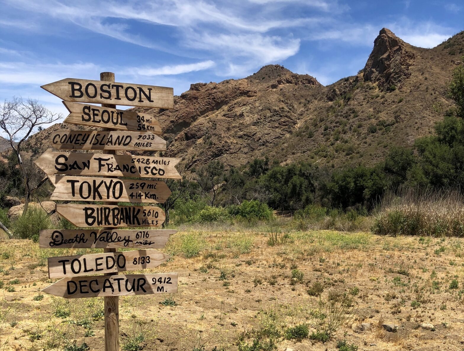 The show “MASH” is an iconic war drama that has an intriguing filming location. Pictured: the signpost of the “MASH” television show at Malibu Creek State Park