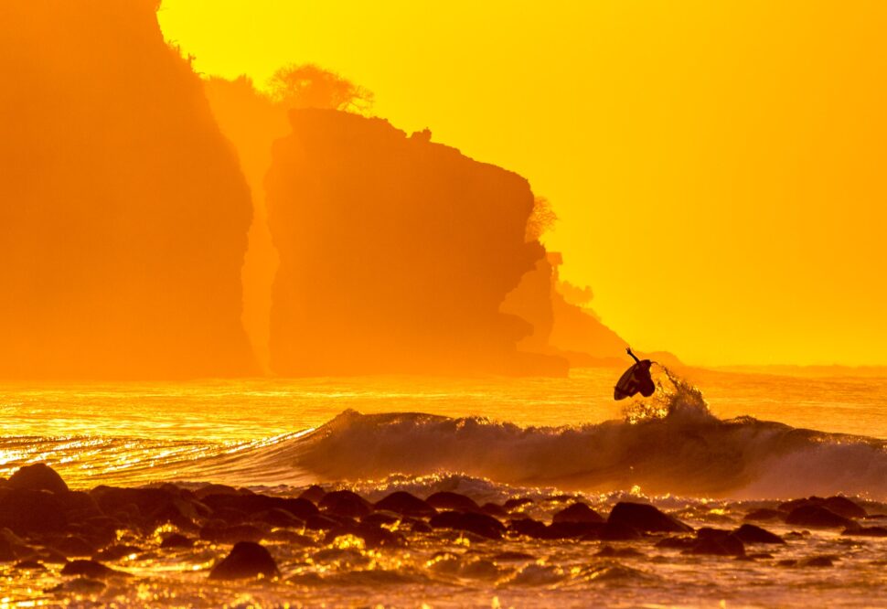 A surfer catches some air