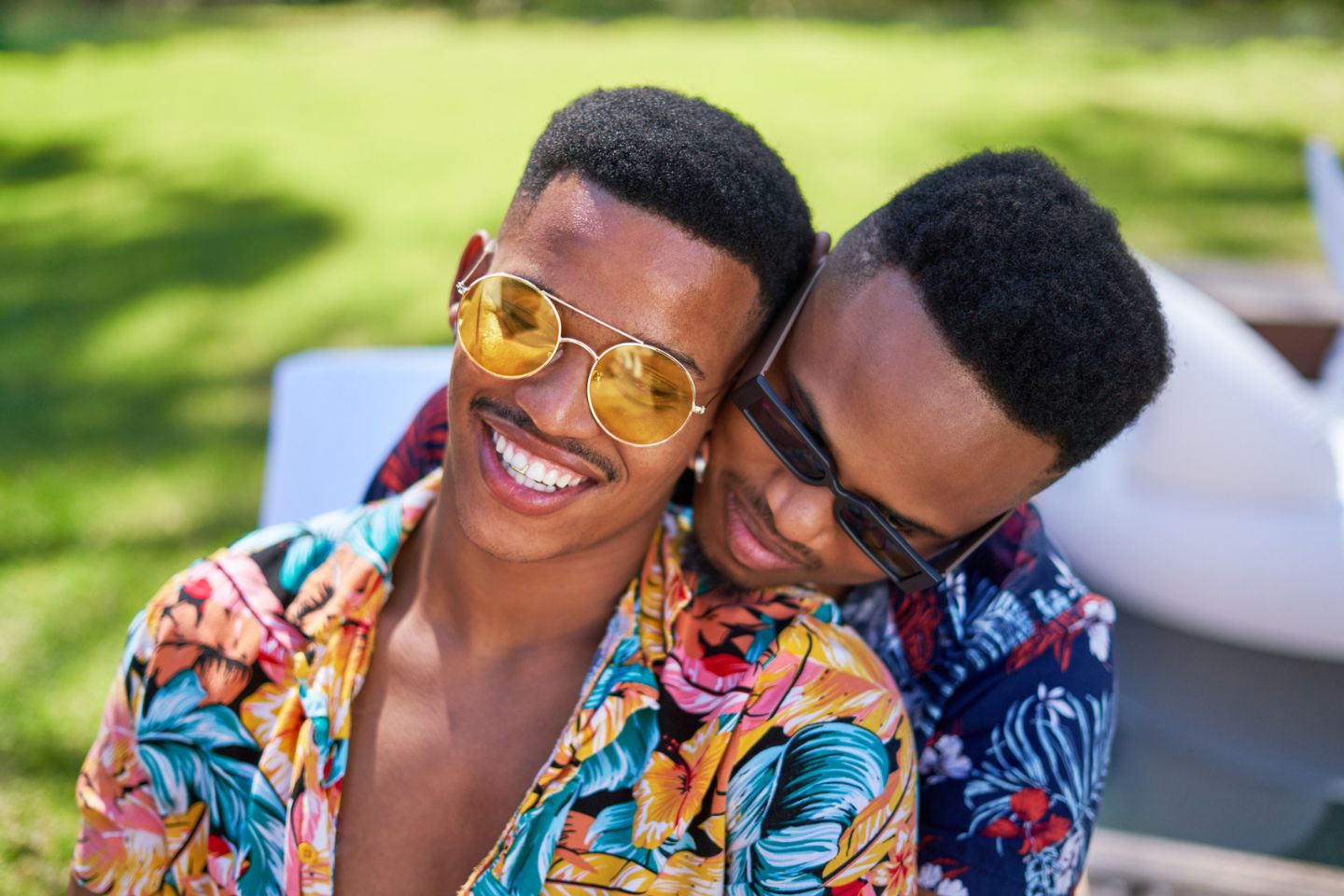 Black male couple hugging