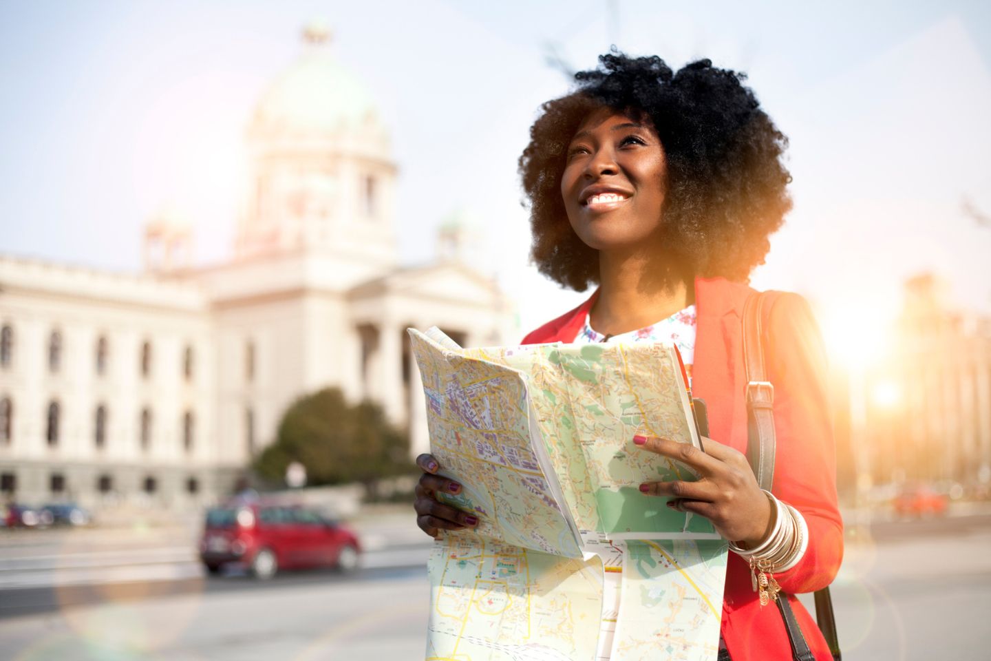 woman exploring with a map in hand