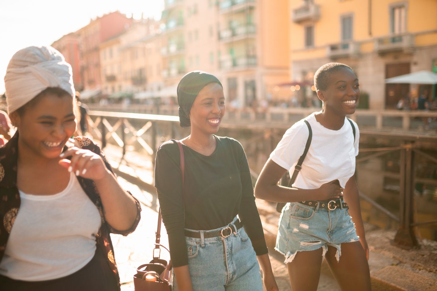 group of female friends walking together in Italy