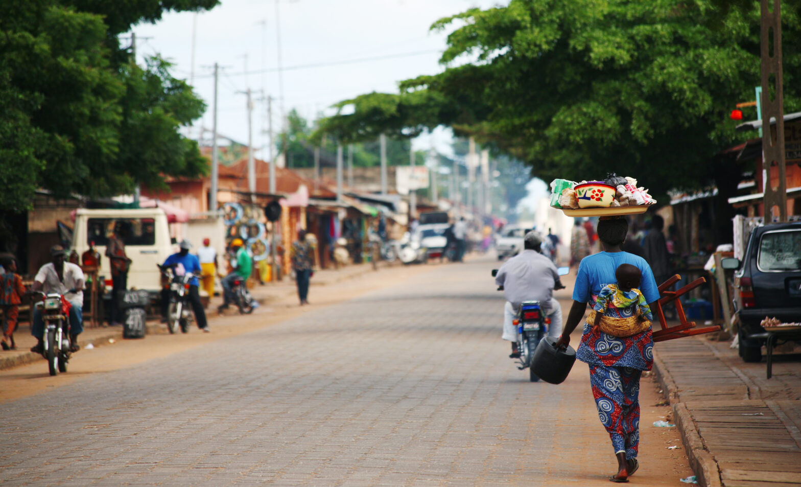 people walking on street in a town in Africa