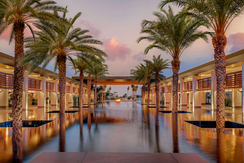 pool view of Conrad Tulum at sunset, a luxury resort