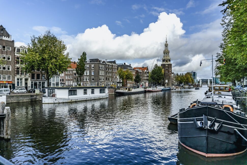 house boats along the canals in Amsterdam, The Netherlands